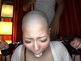 Asian beauties lose their lush locks in a steamy headshave session, revealing their smooth scalps for your pleasure.